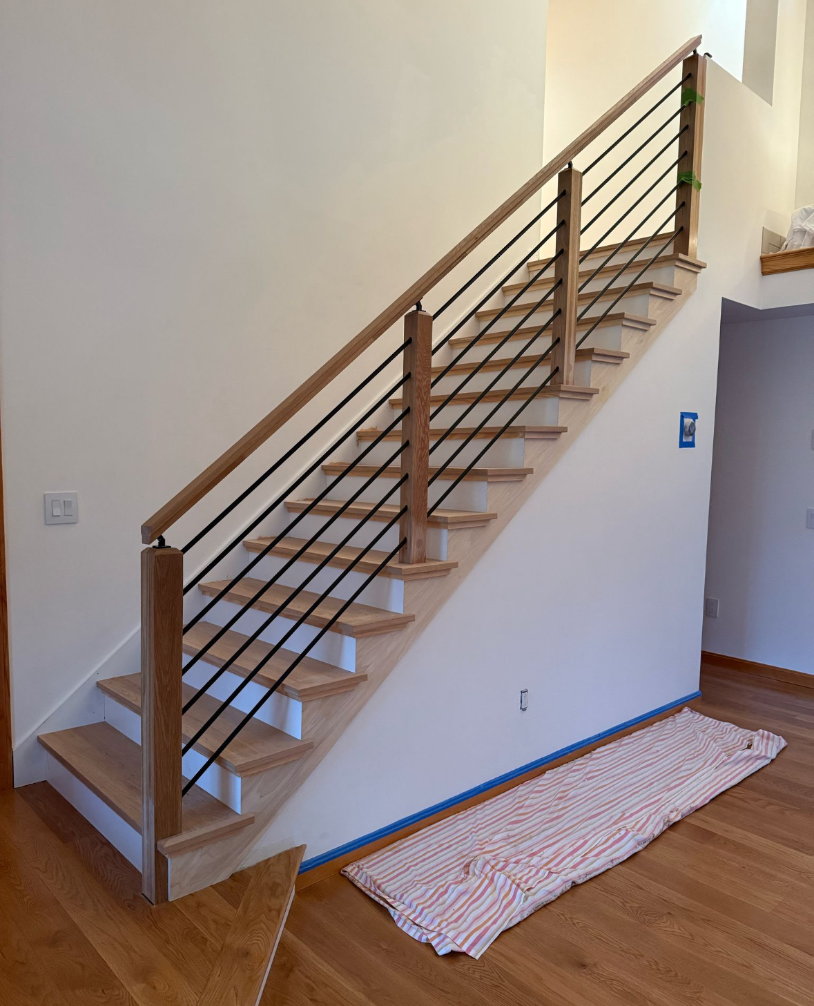 Modern staircase with horizontal railing