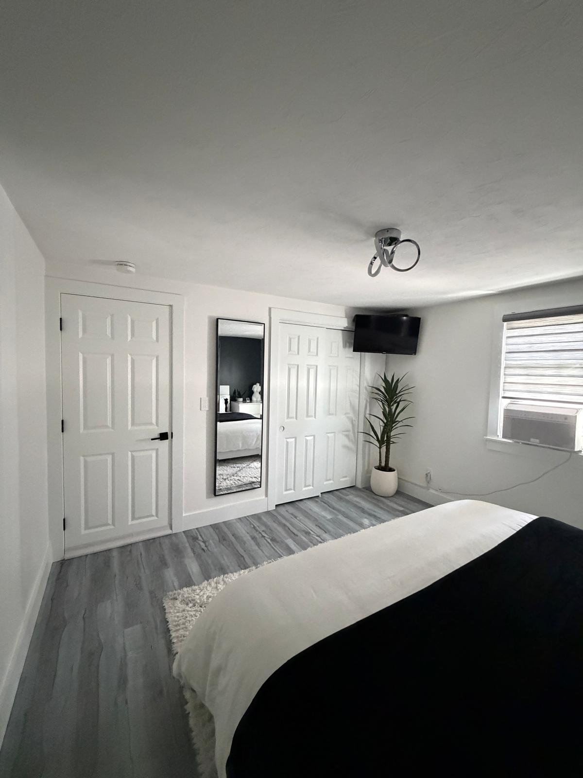 Remodeled bedroom with finished interior trim